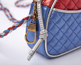 Borsa trapuntanta laminata in pelle